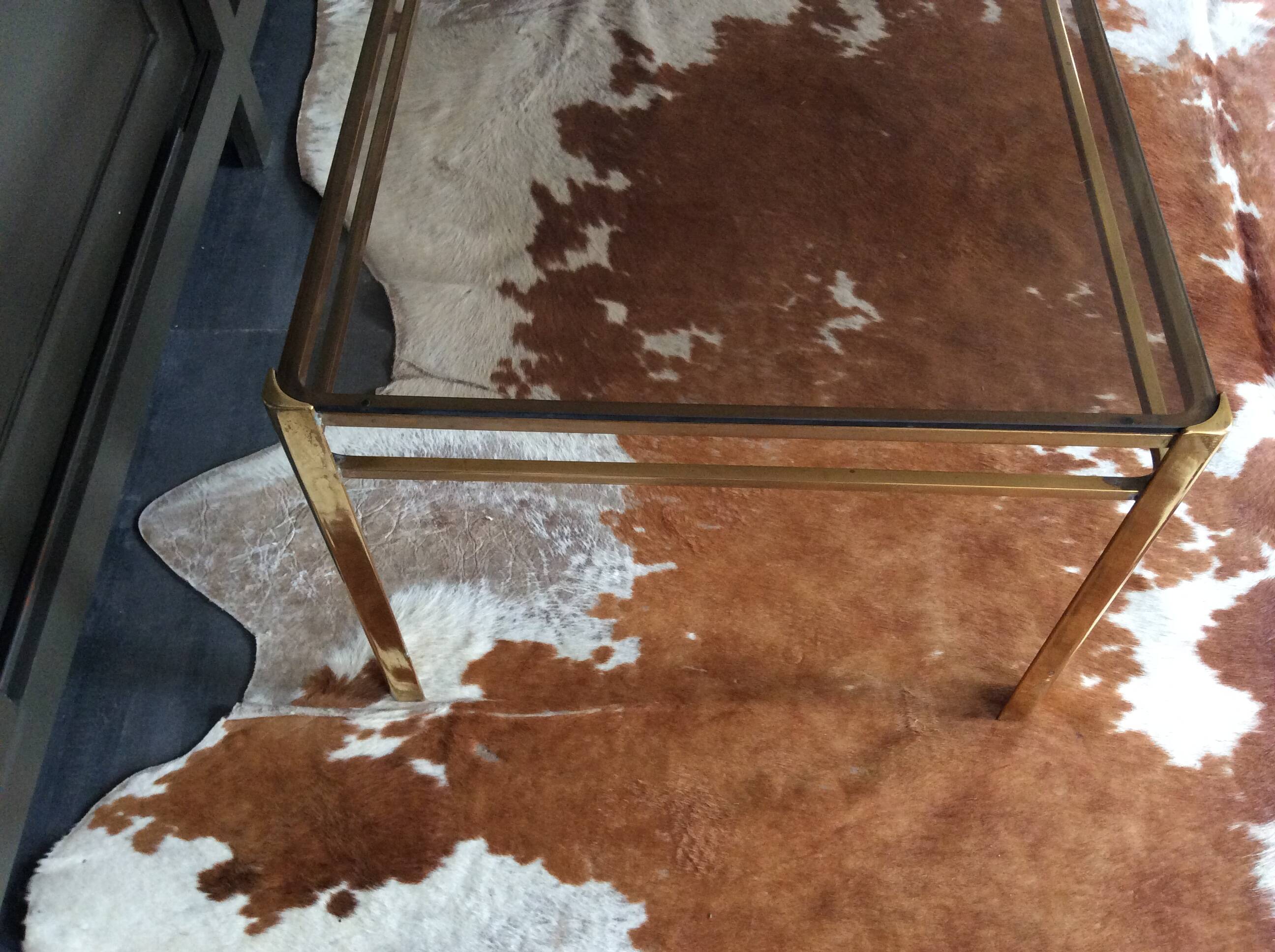 Glass and brass coffee table