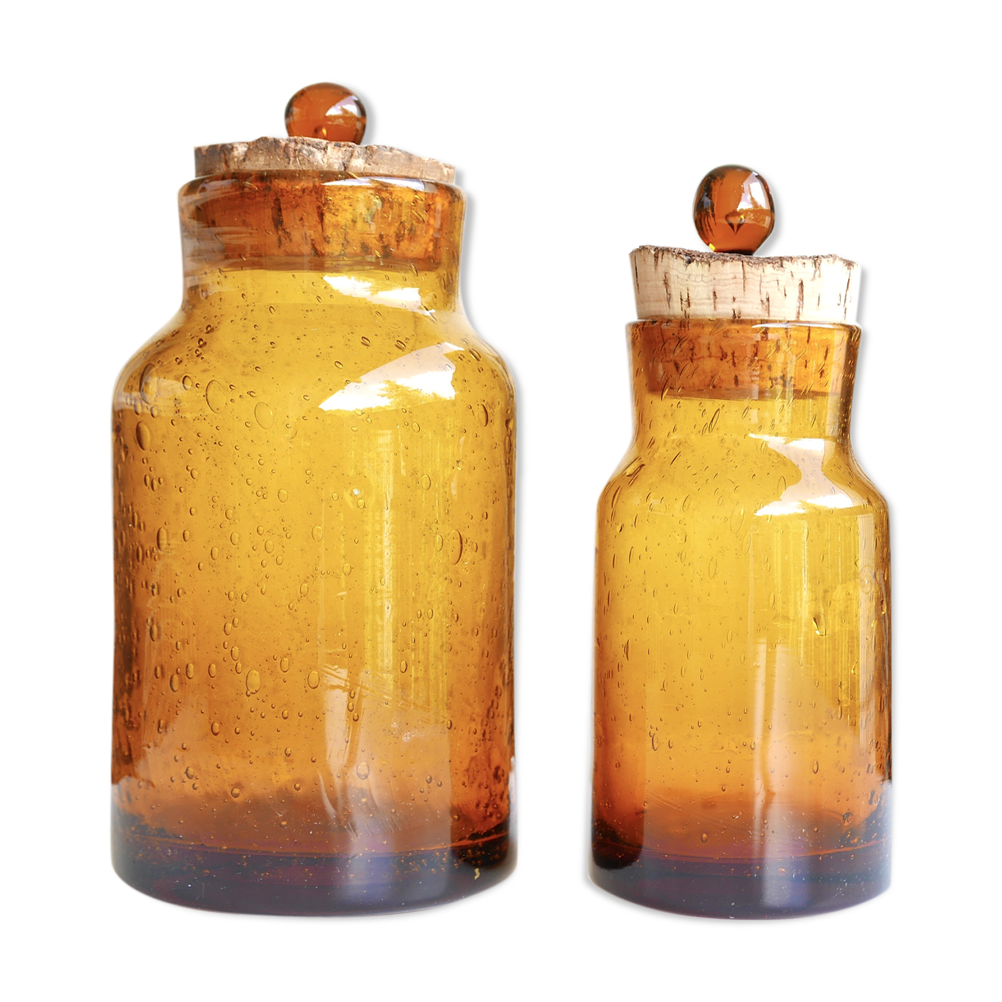 2 amber blown glass jars, cork stoppers