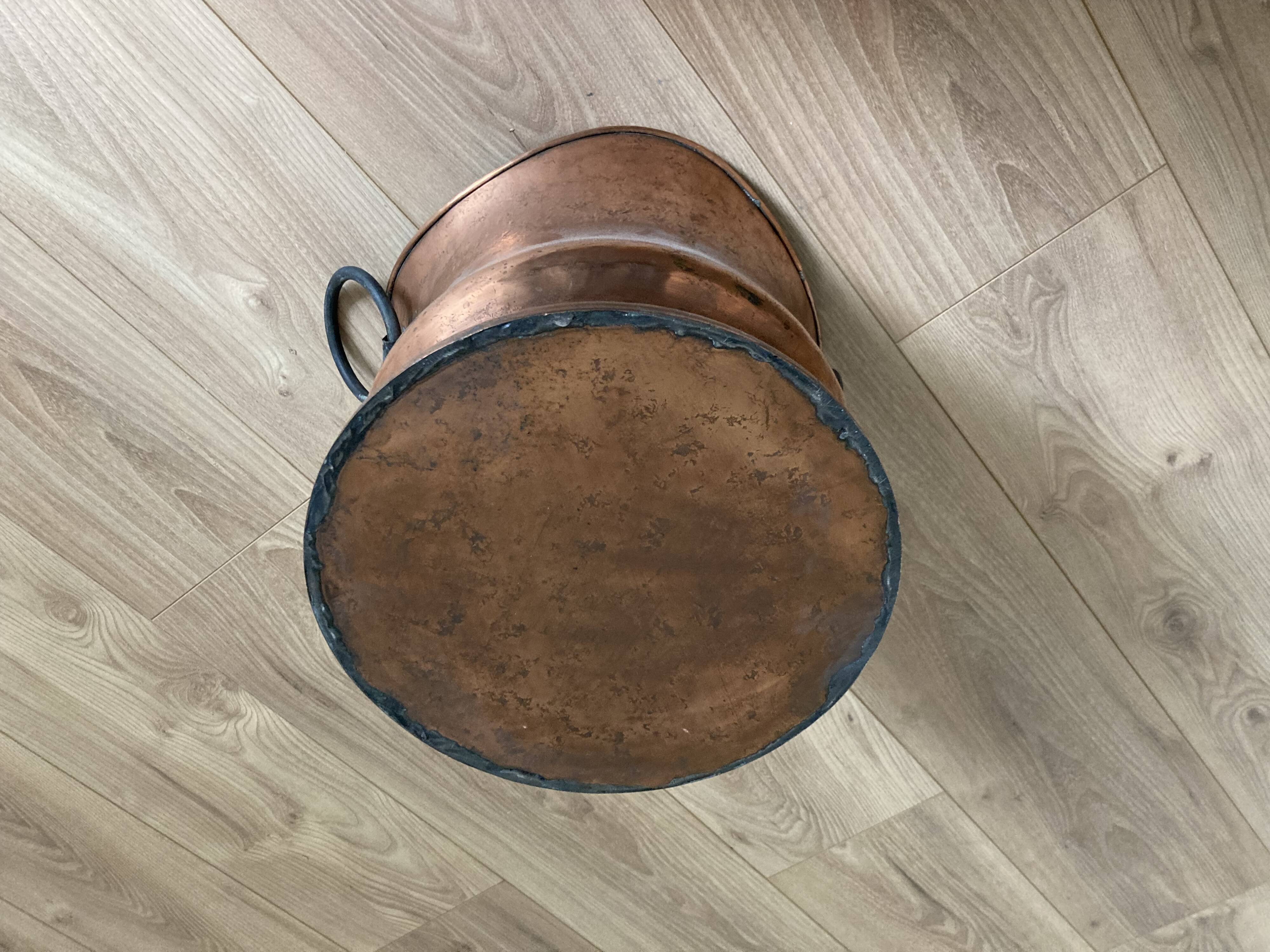 Old copper pot cover