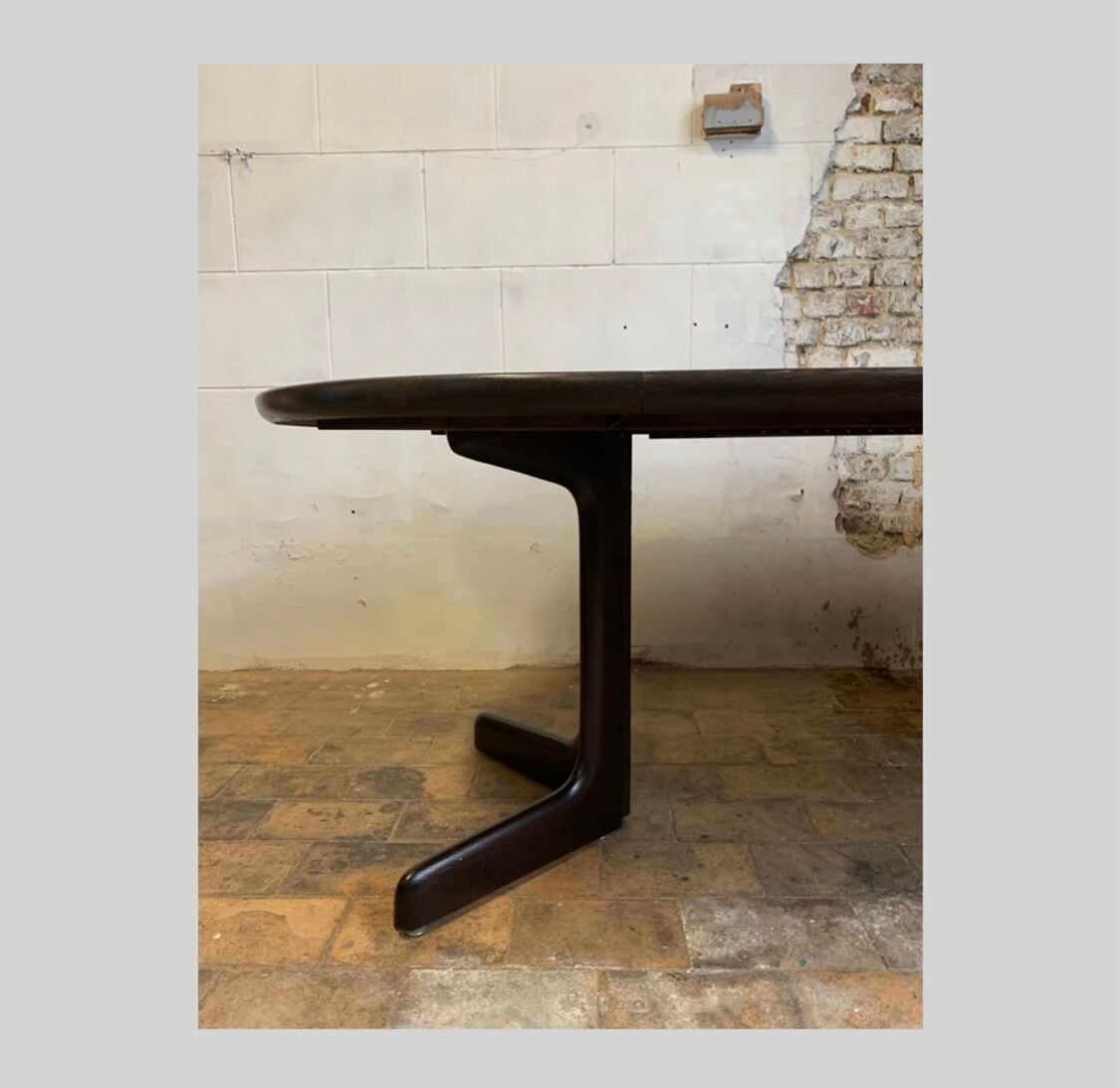 Dark wood extendable dining table, 1970s