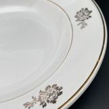 Oval serving dish with flower pattern and silver border