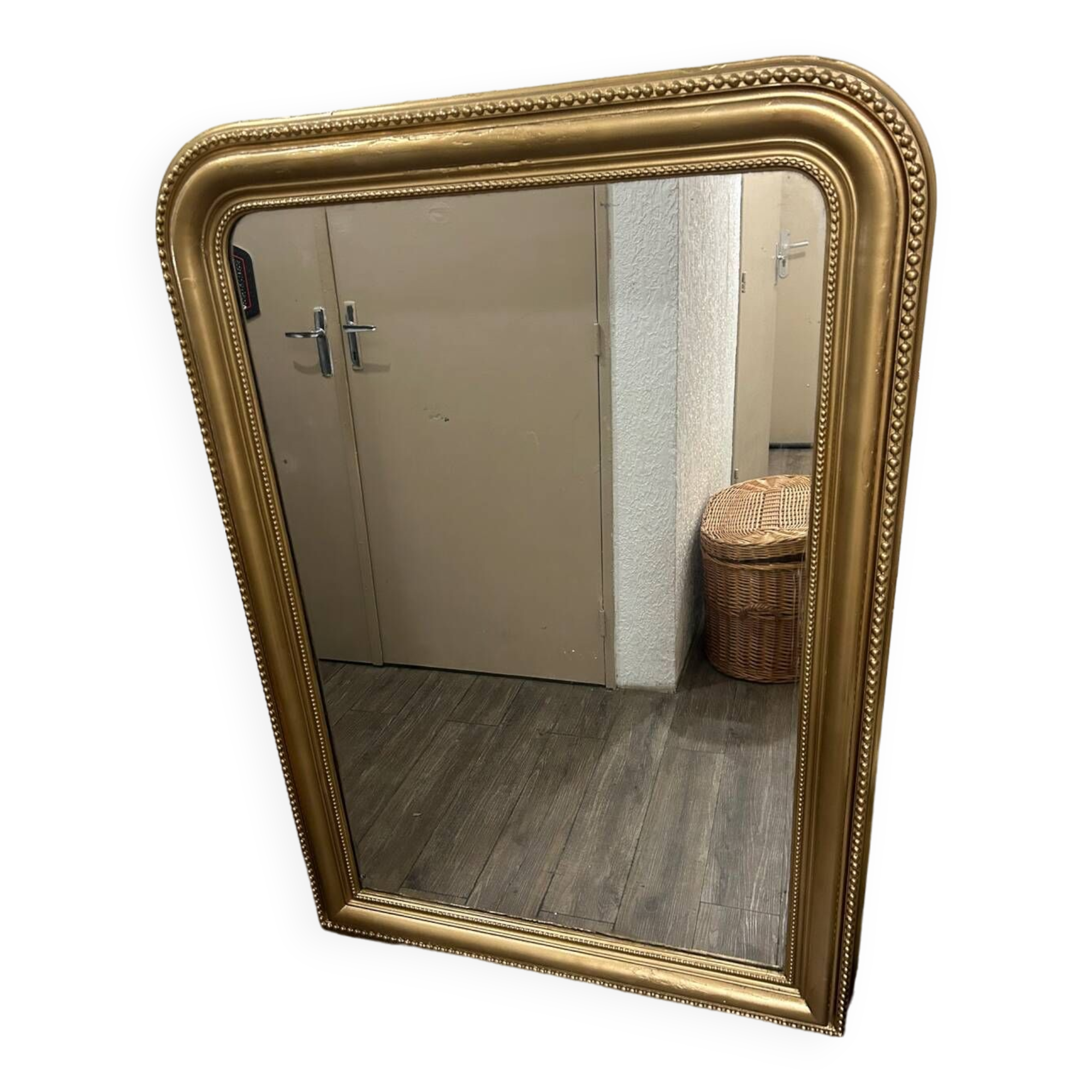 Antique gilded mirror in old Louis Philippe wood