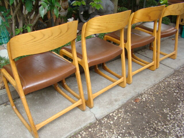 Series of four baumann sleigh chairs