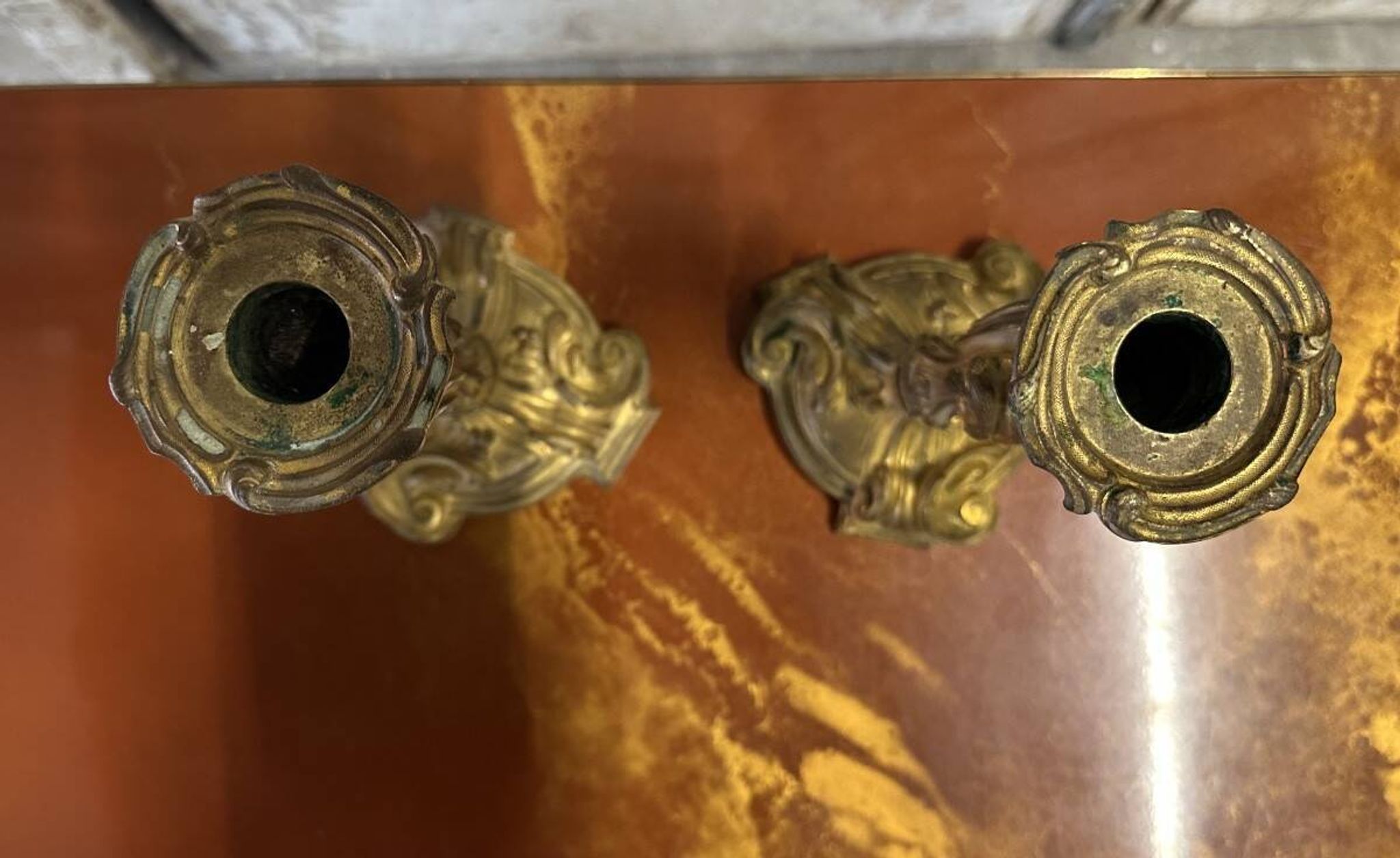 Pair of bronze candlesticks from the early 20th century in Louis XV style.