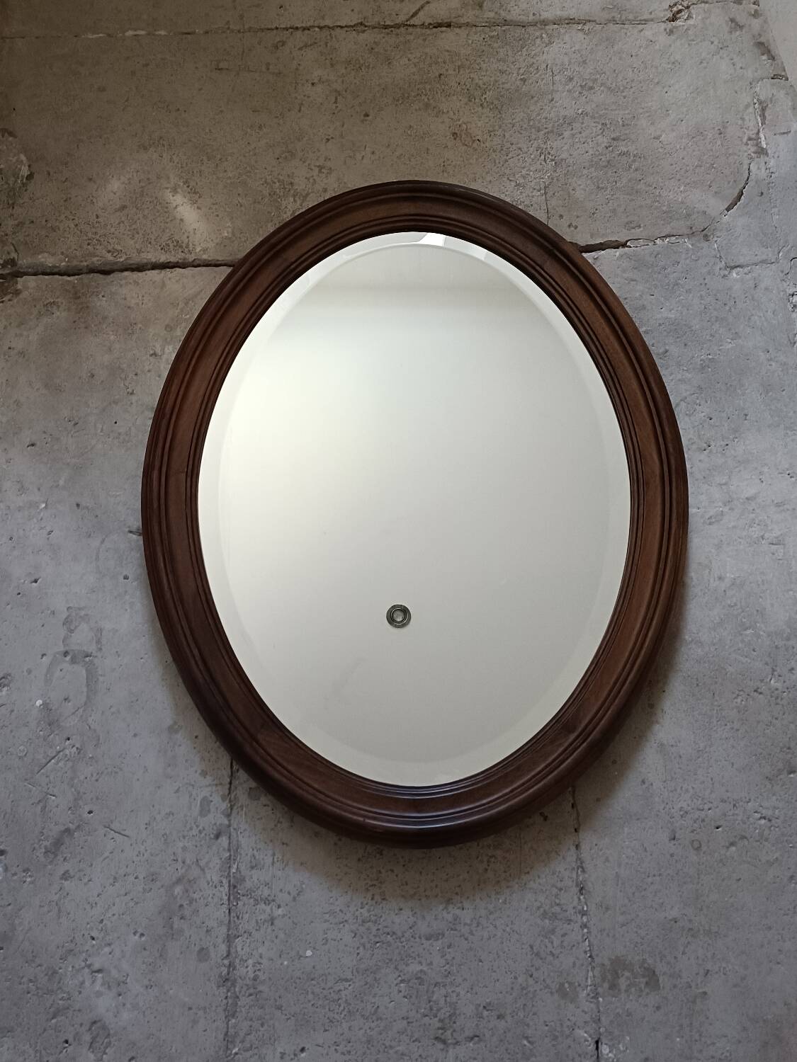 Antique oval beveled mirror