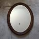 Antique oval beveled mirror