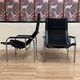 PAIRE DE FAUTEUILS CUIR NOIR ET CHROME HANS EICHENBERGER 1960.
