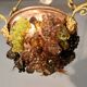 Bronze three-armed chandelier with a grape decoration.