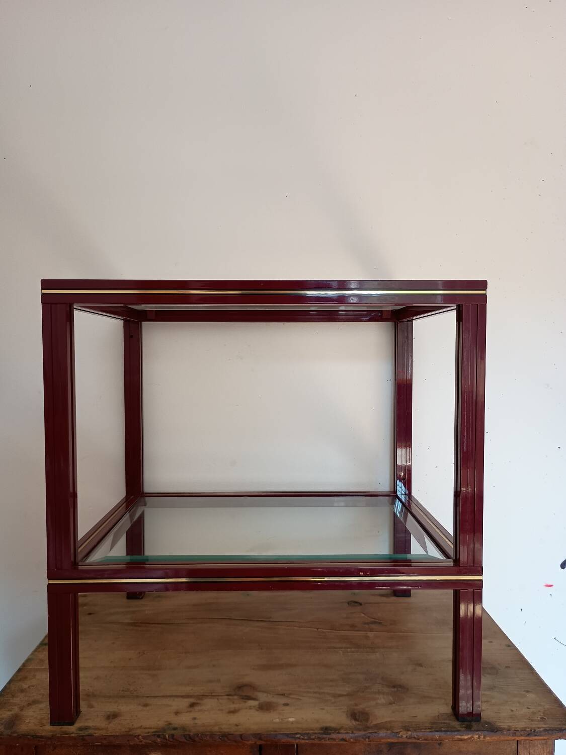 Side table in glass and brass