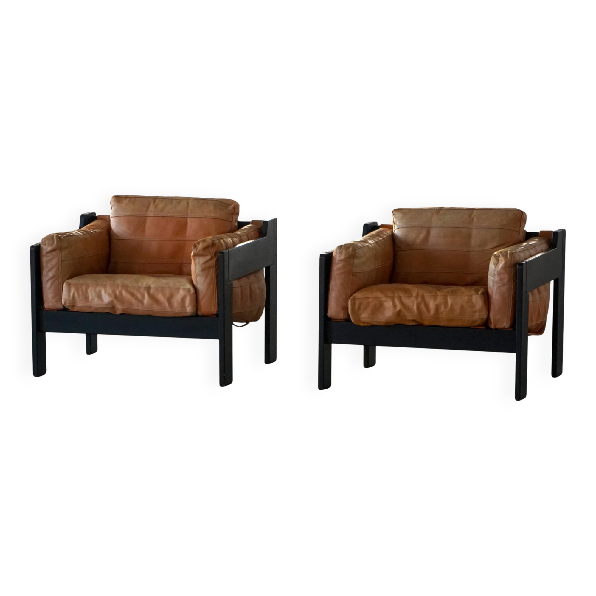 Pair of wooden and leather armchairs by Rud Thygesen & Johnny Sørensen, 1970s.