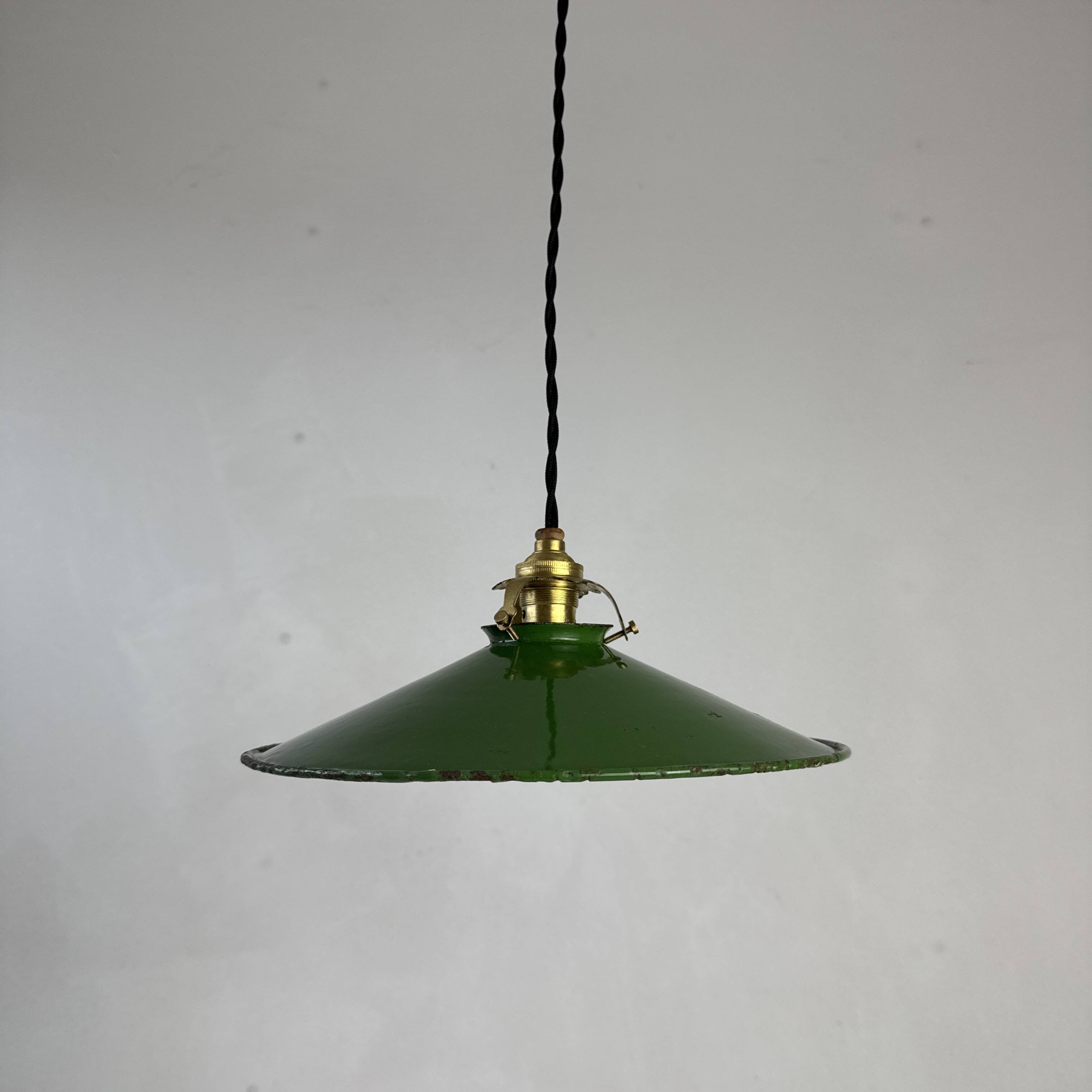 Old conical industrial pendant light in green enamelled sheet metal