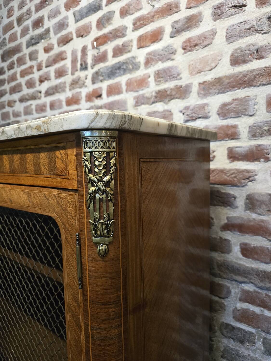 Marquetry bookcase with marble top