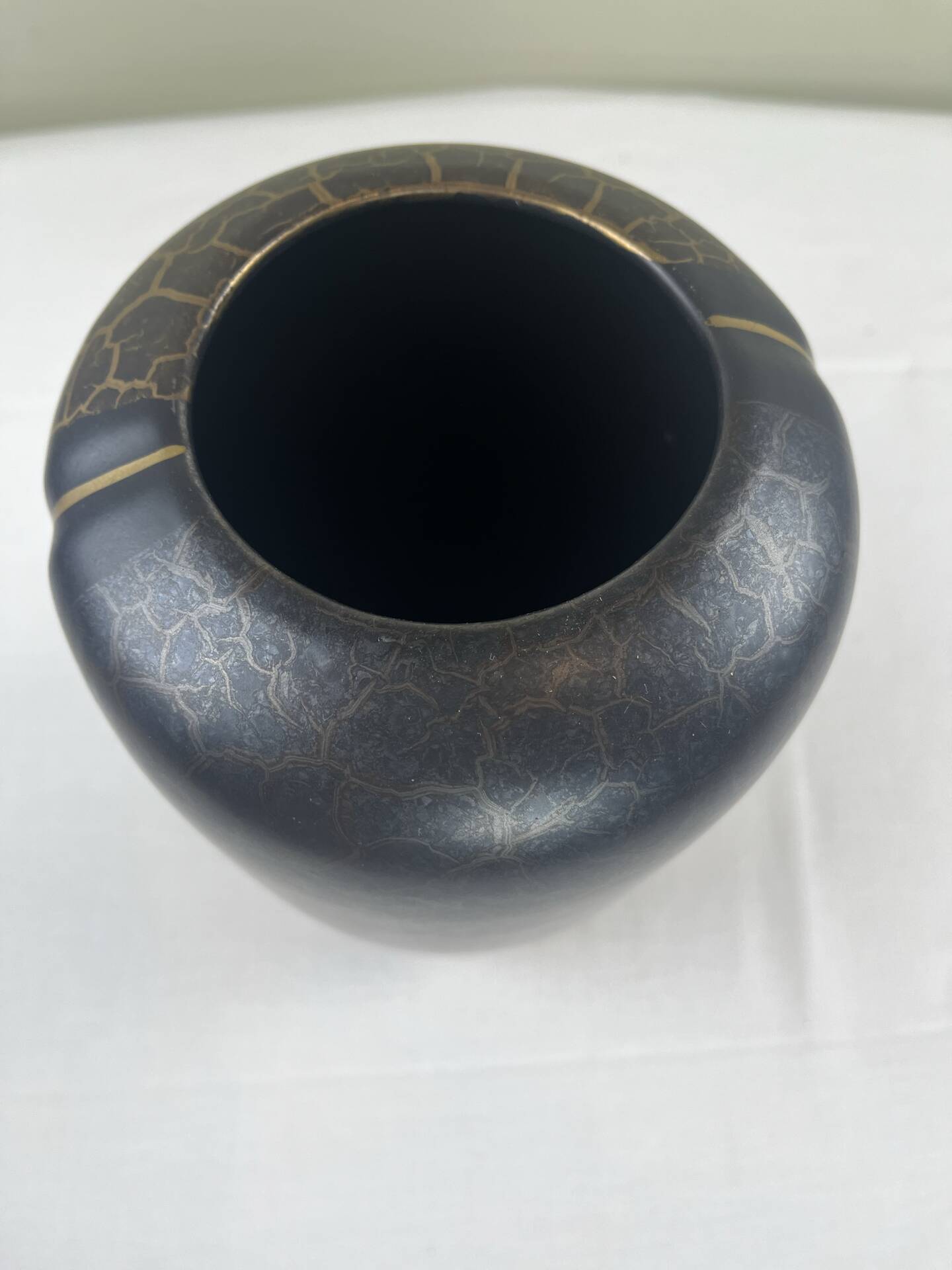 Vase with golden scales