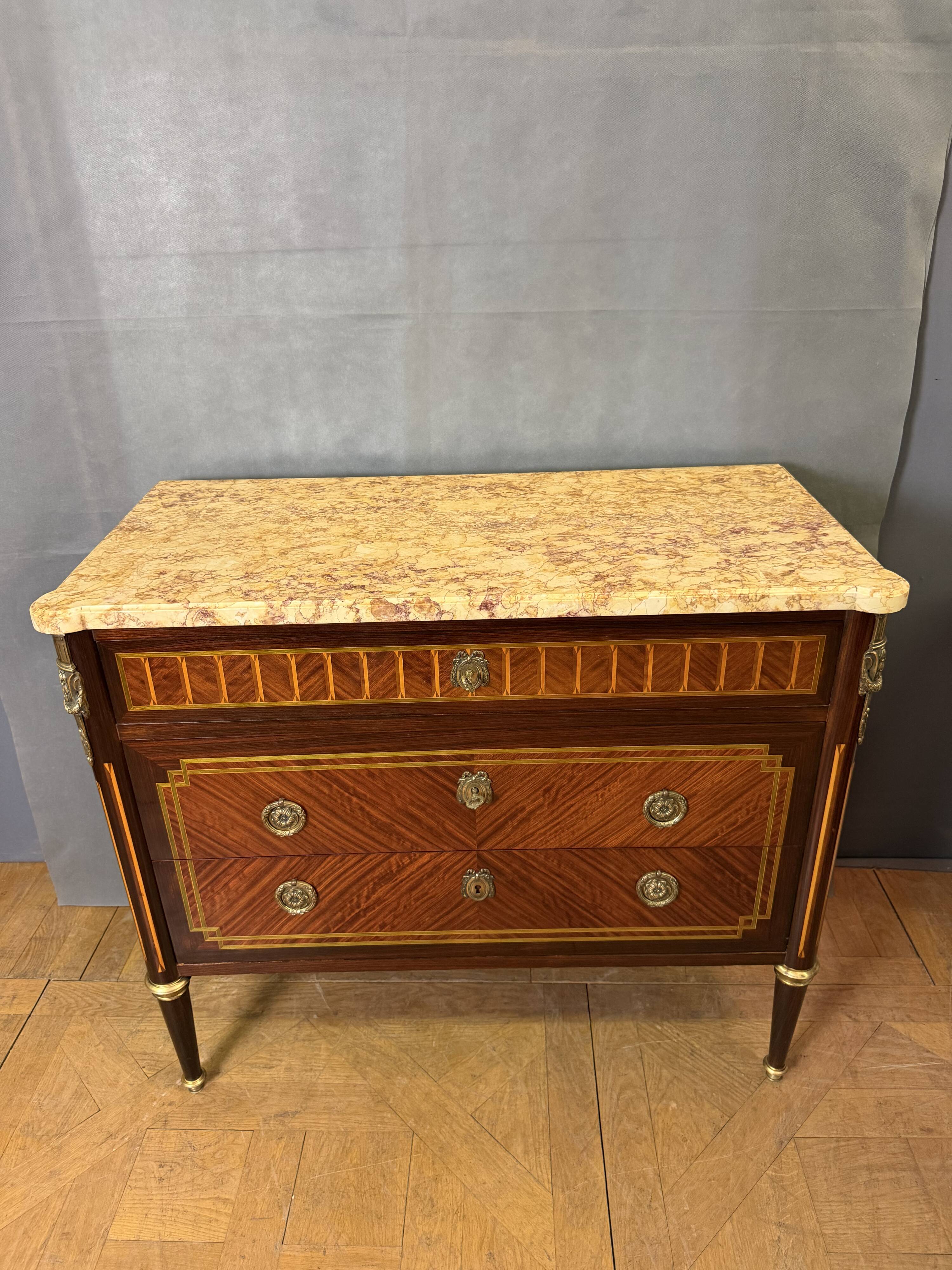 Louis XVI commode from the late 19th century.