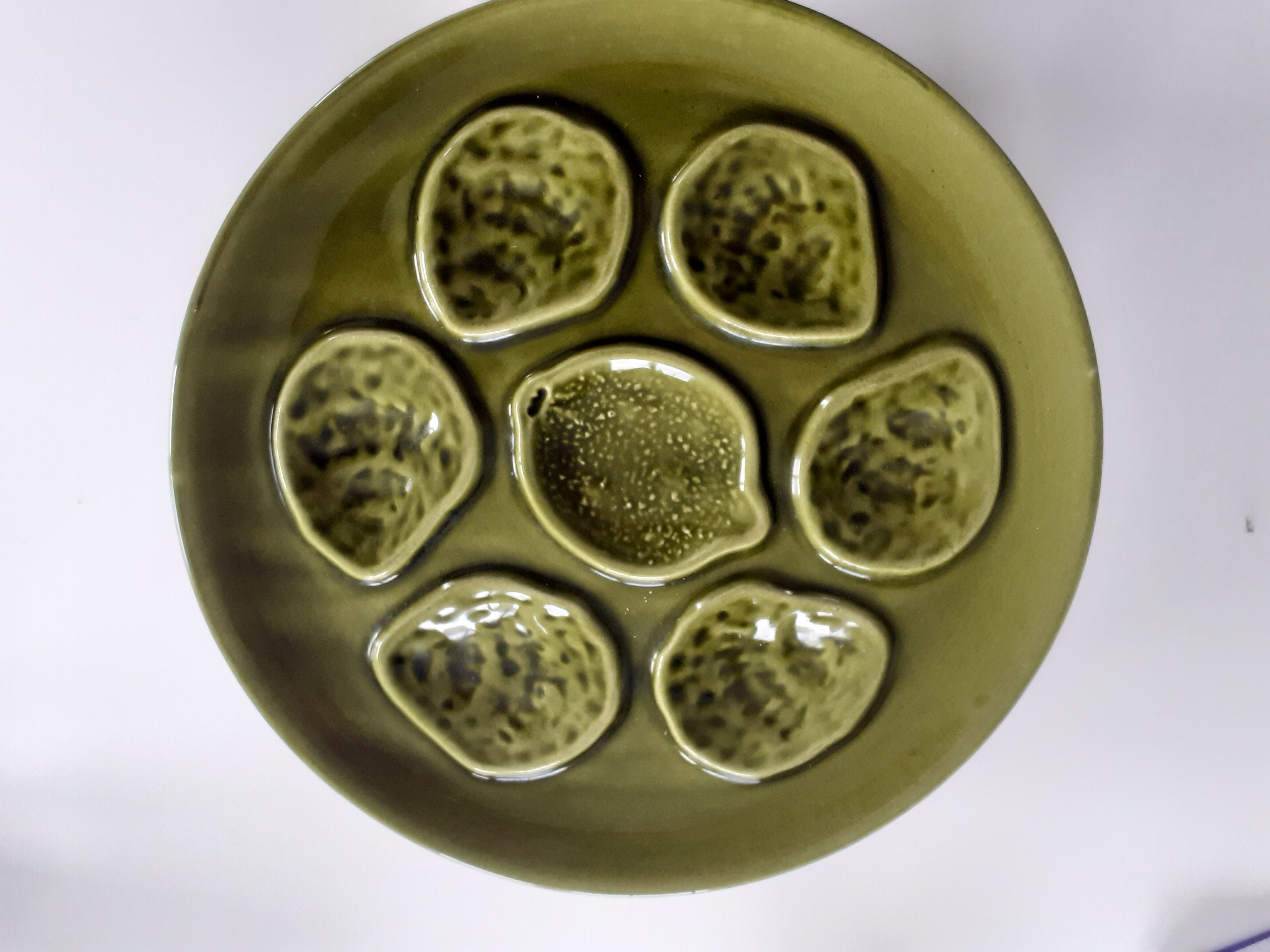 Mid-century oyster plates from the Niderviller pottery