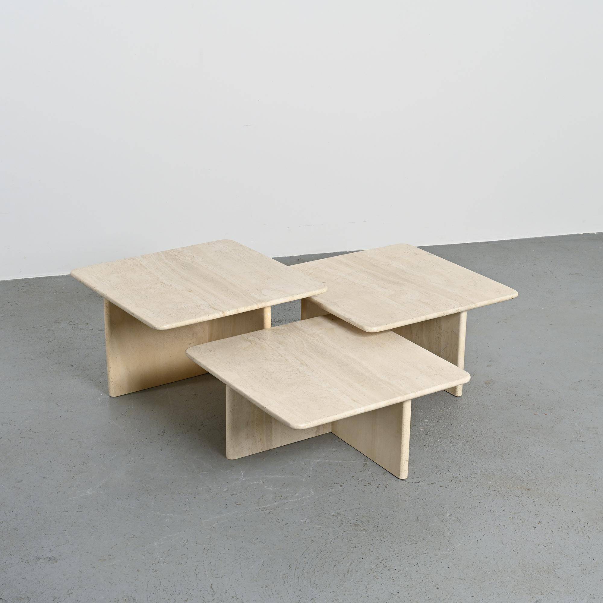 Set of three nesting tables in travertine, Italy circa 1970.