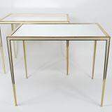 A pair of brass and white mirror tables from Vereinigte Werkstätten, Germany, 1970s.