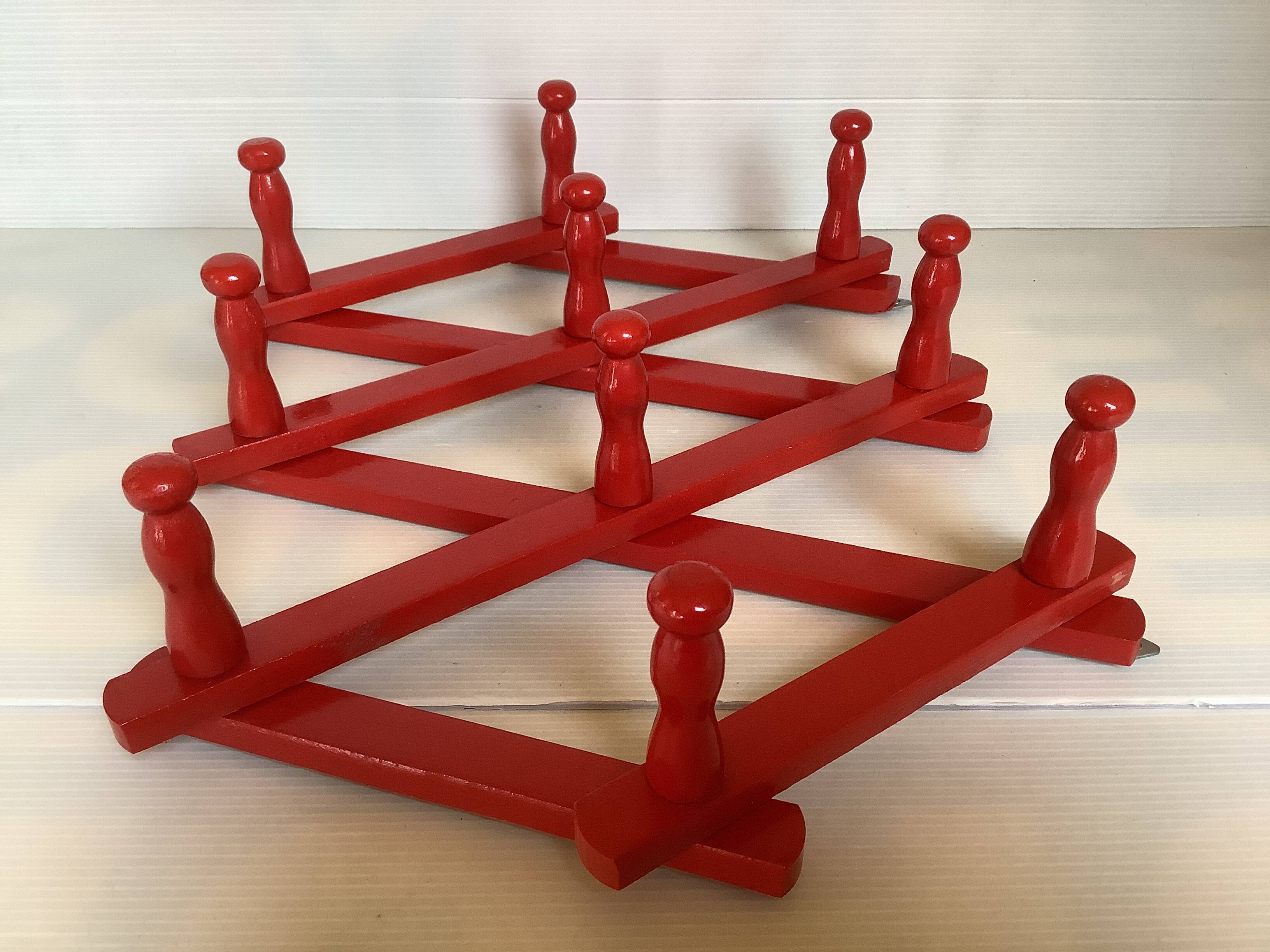 Red wood accordion coat rack