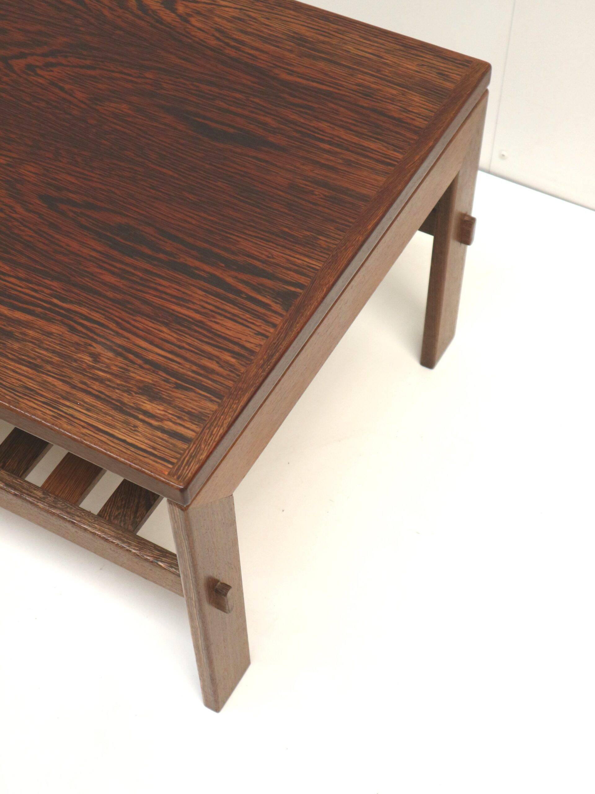 Brutalist wenge coffee table with integrated magazine rack, 1970s
