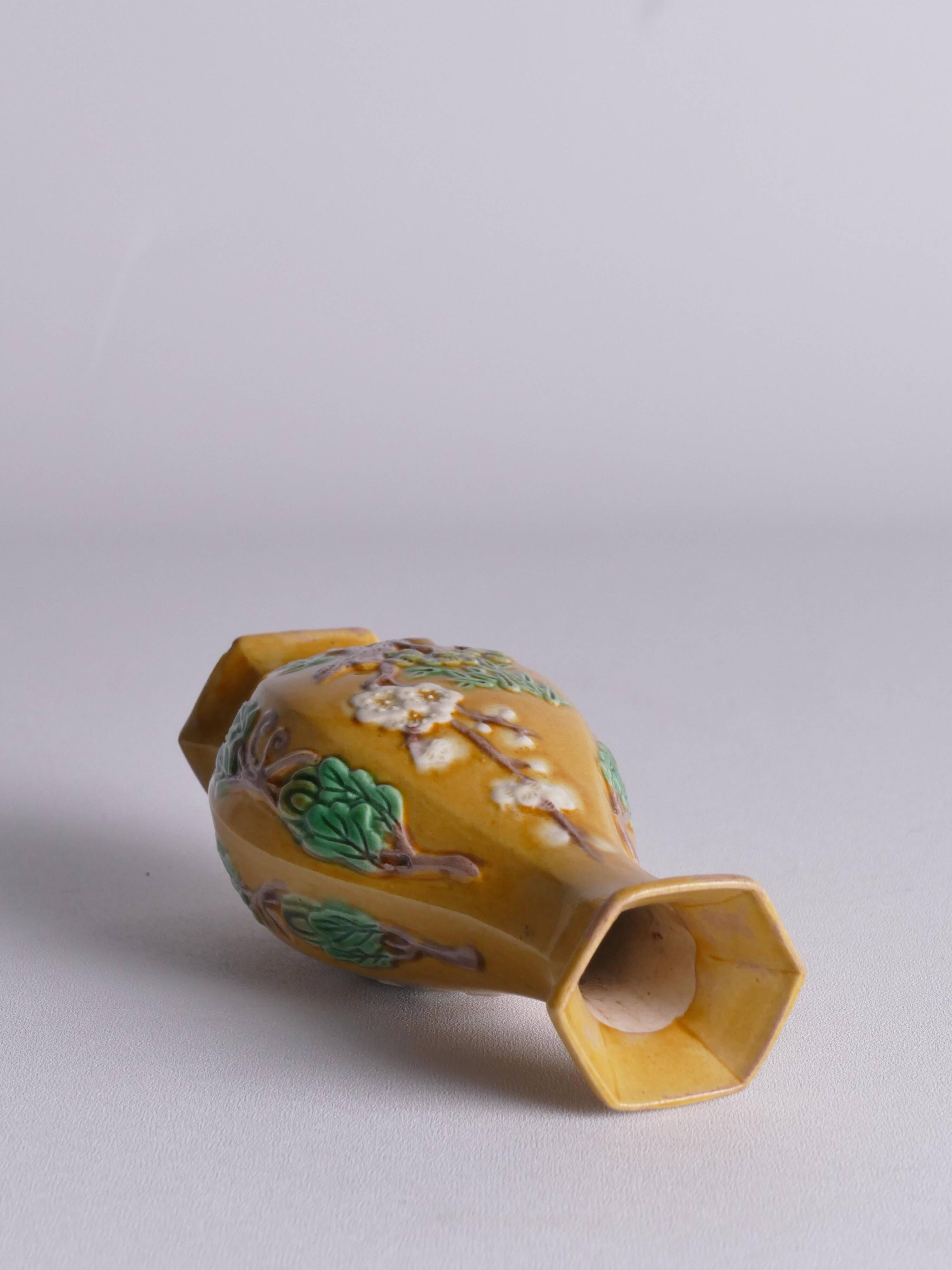 Chinese Yellow Glazed Hexagonal Relief Porcelain Vase with Prunus Motif