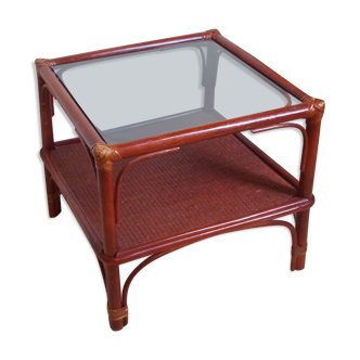 Table basse en rotin vernis et plateau en verre fumé