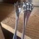 Silver metal sugar tongs from the Gombault house for tea time.
