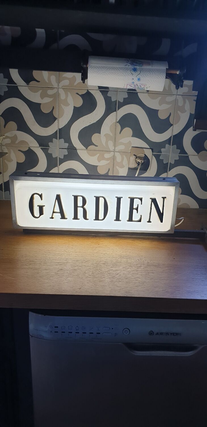 Illuminated panel guardian lodge