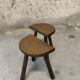 Vintage wooden tripod stool pair.