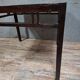 ancient Asian table, made of solid wood with a dark brown patina