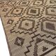 Vintage Touareg mat made of leather and reeds.