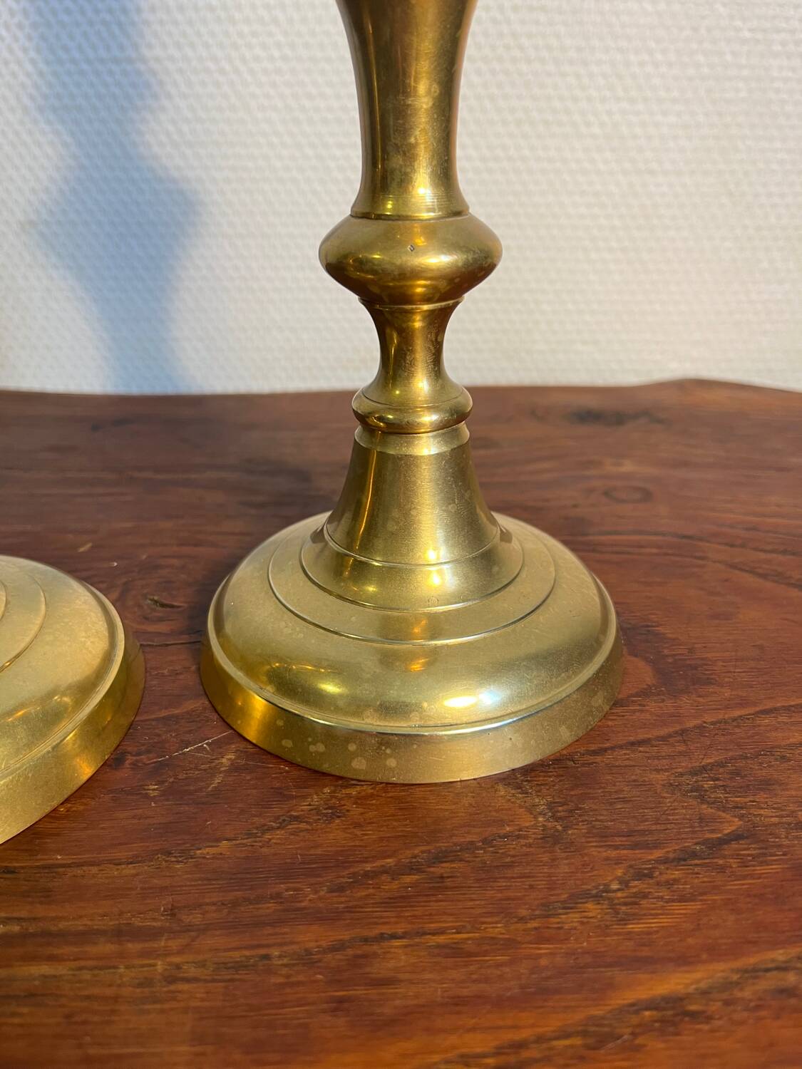 Pair of duo of ringed brass candlesticks