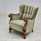 Fauteuil danois des années 1960, velours vert, bois de chêne sculpté.