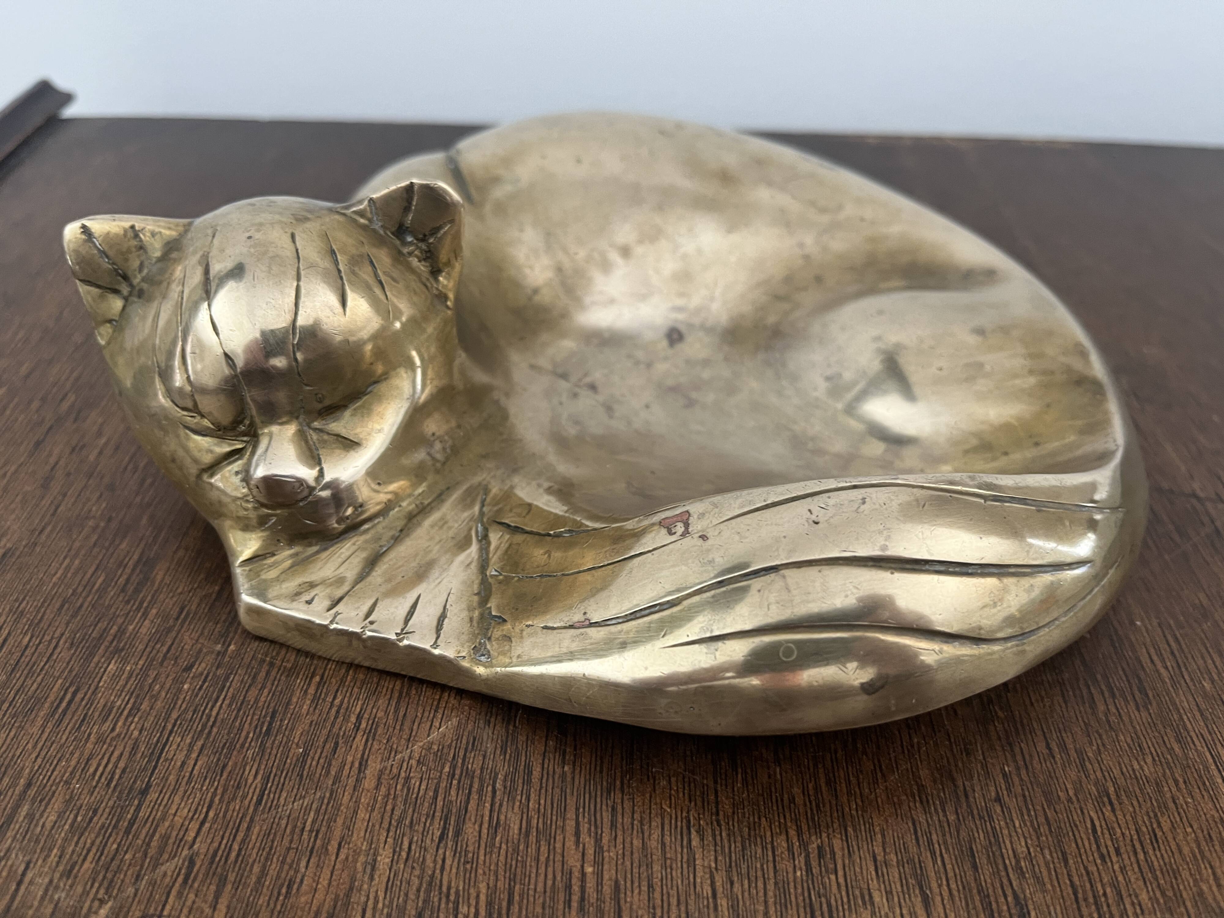 bronze cat emptier from the 1930s