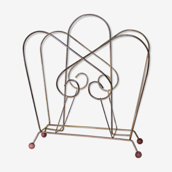 Magazine rack in gold metal