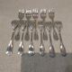 11 silver-plated cake forks with PP shell decor