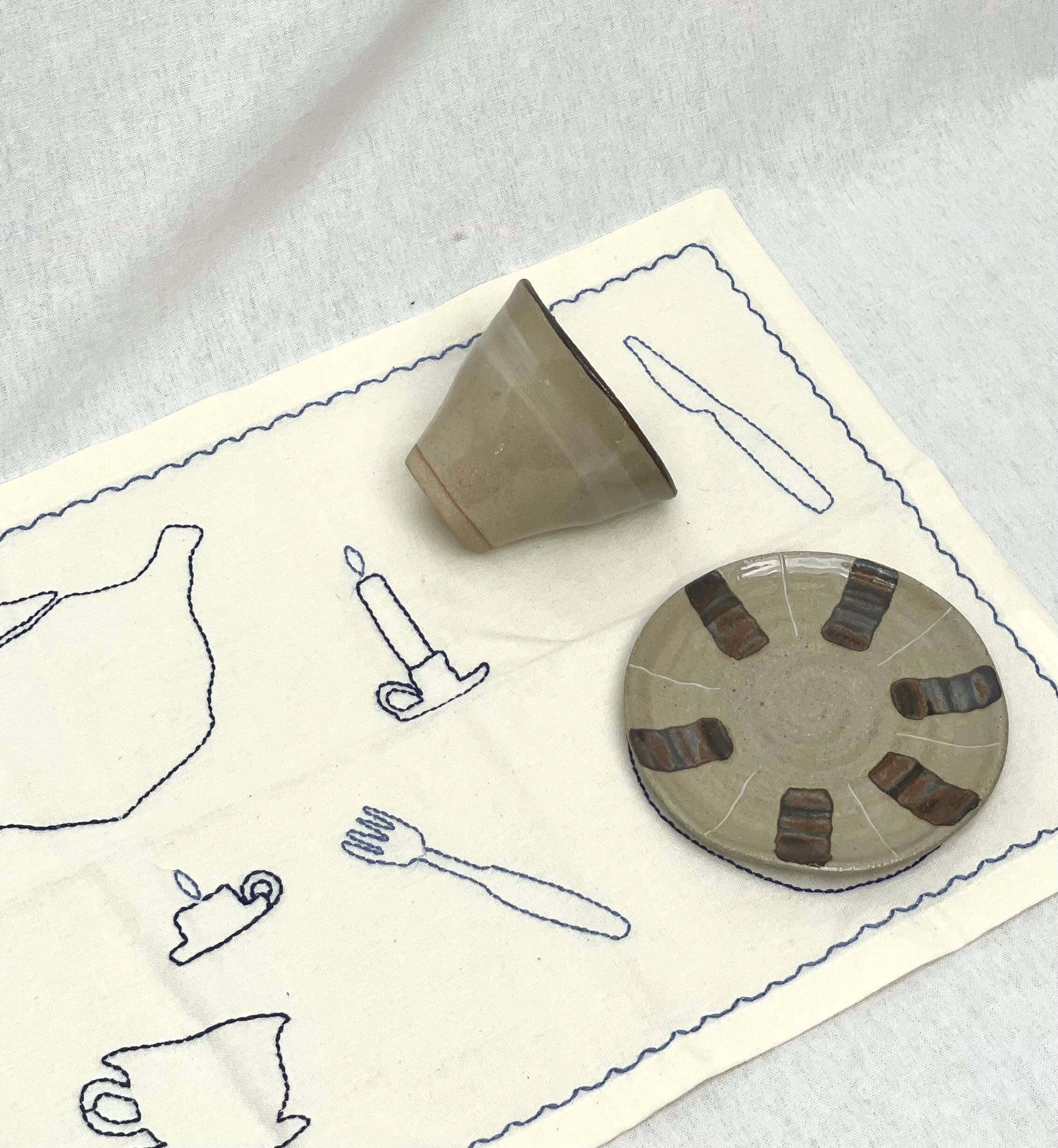 Stoneware cup and saucer