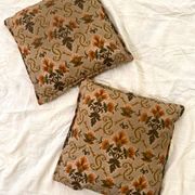 Duo of jacquard cushions 70