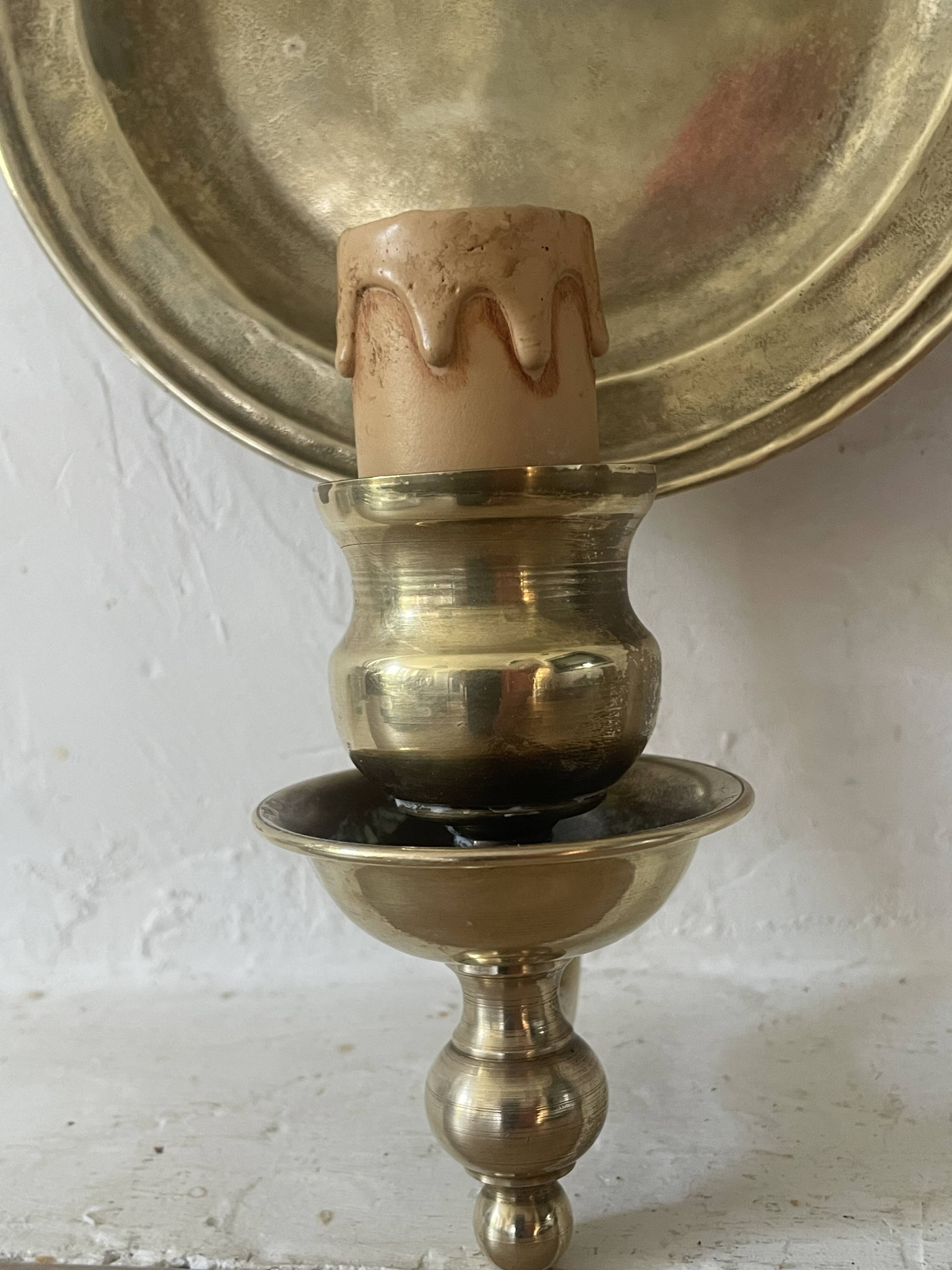 Pair of vintage wall sconces in textured brass, brutalist style.