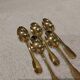 5 gilt metal mocha spoons by Christofle silversmiths, Cluny pattern, 10cm