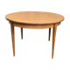 Extendable round vintage dining table