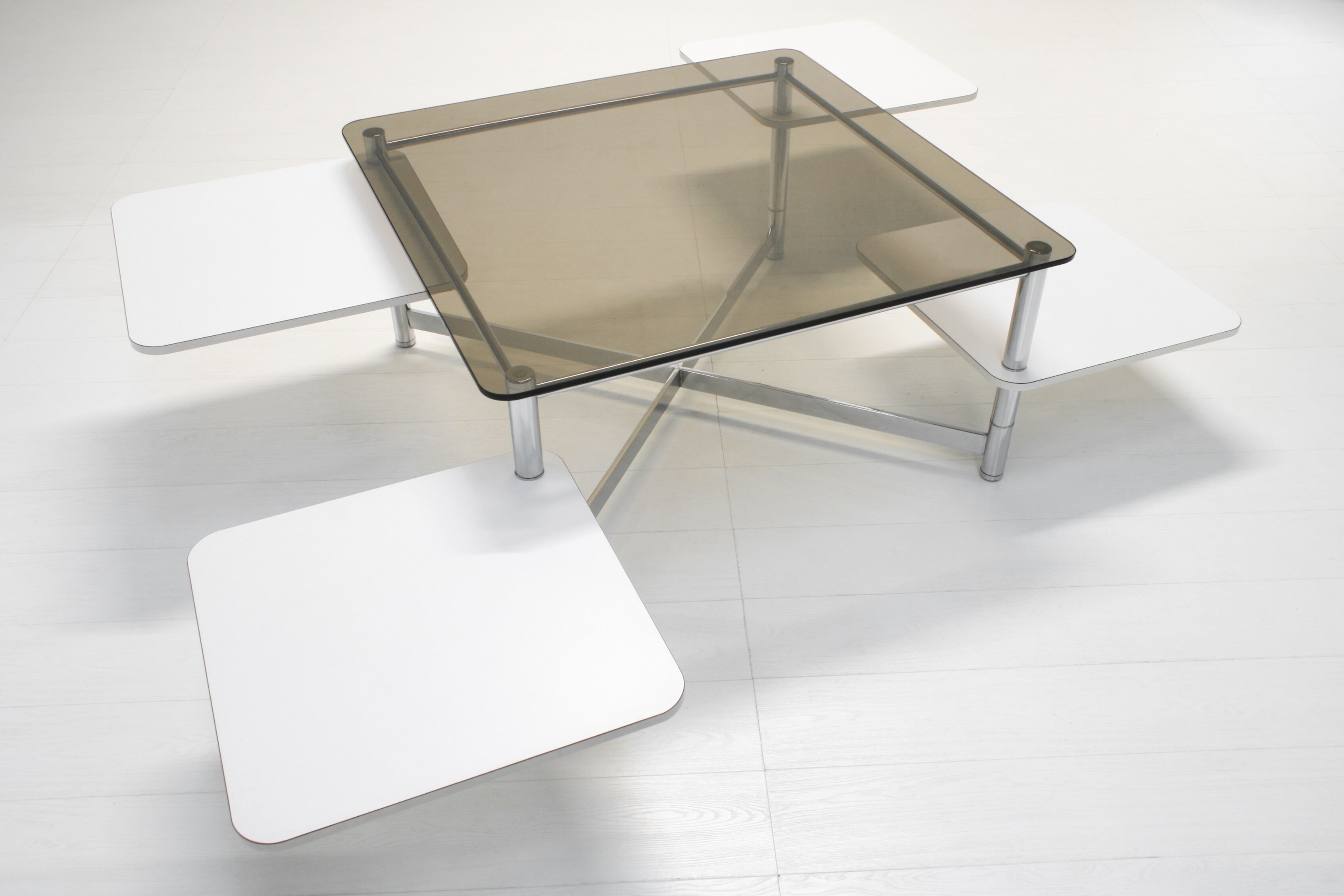 Vintage 1970s smoked glass swivel platform coffee table