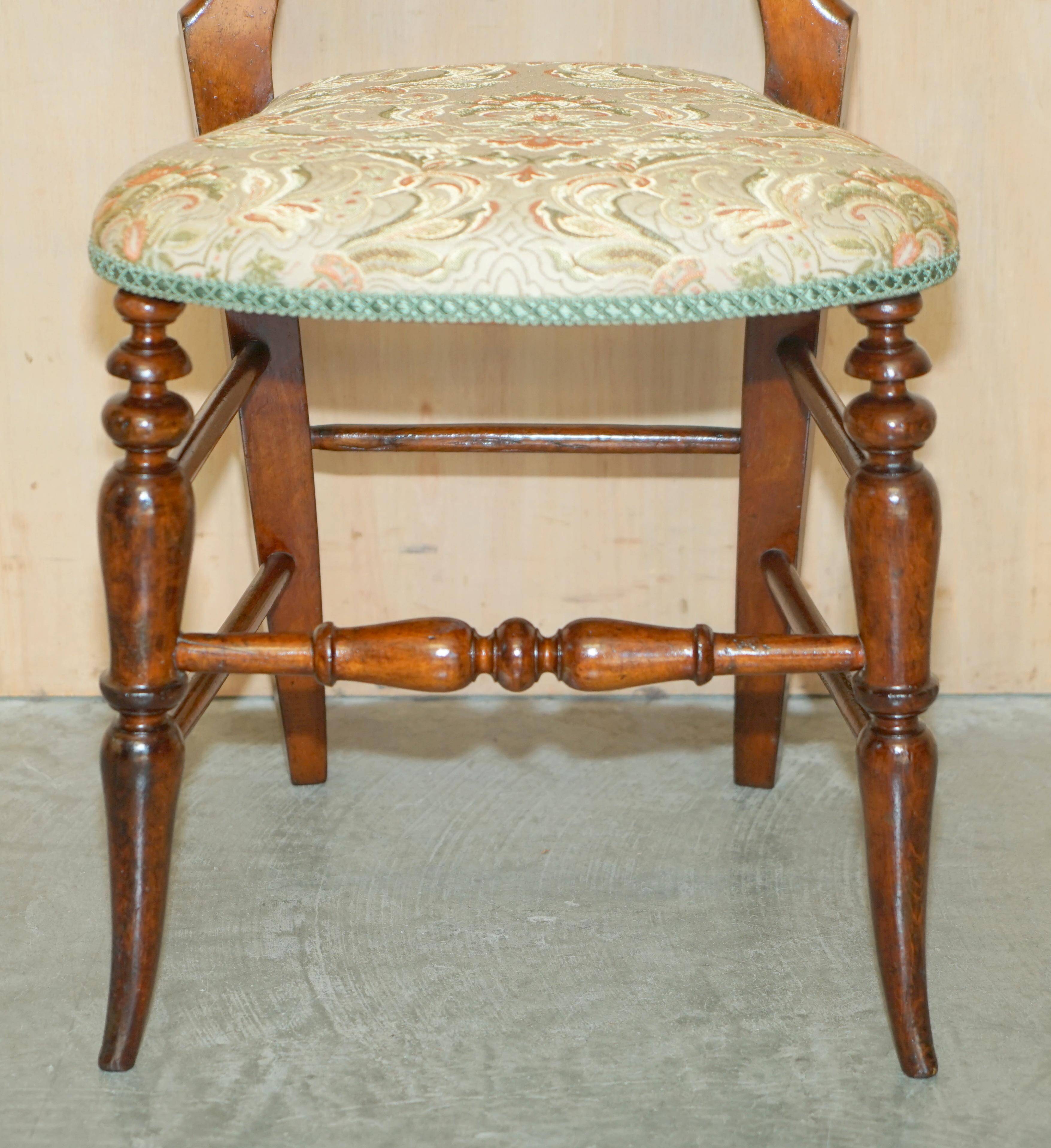 Victorian walnut dressing table chair from around 1880 with a medallion on the backrest.