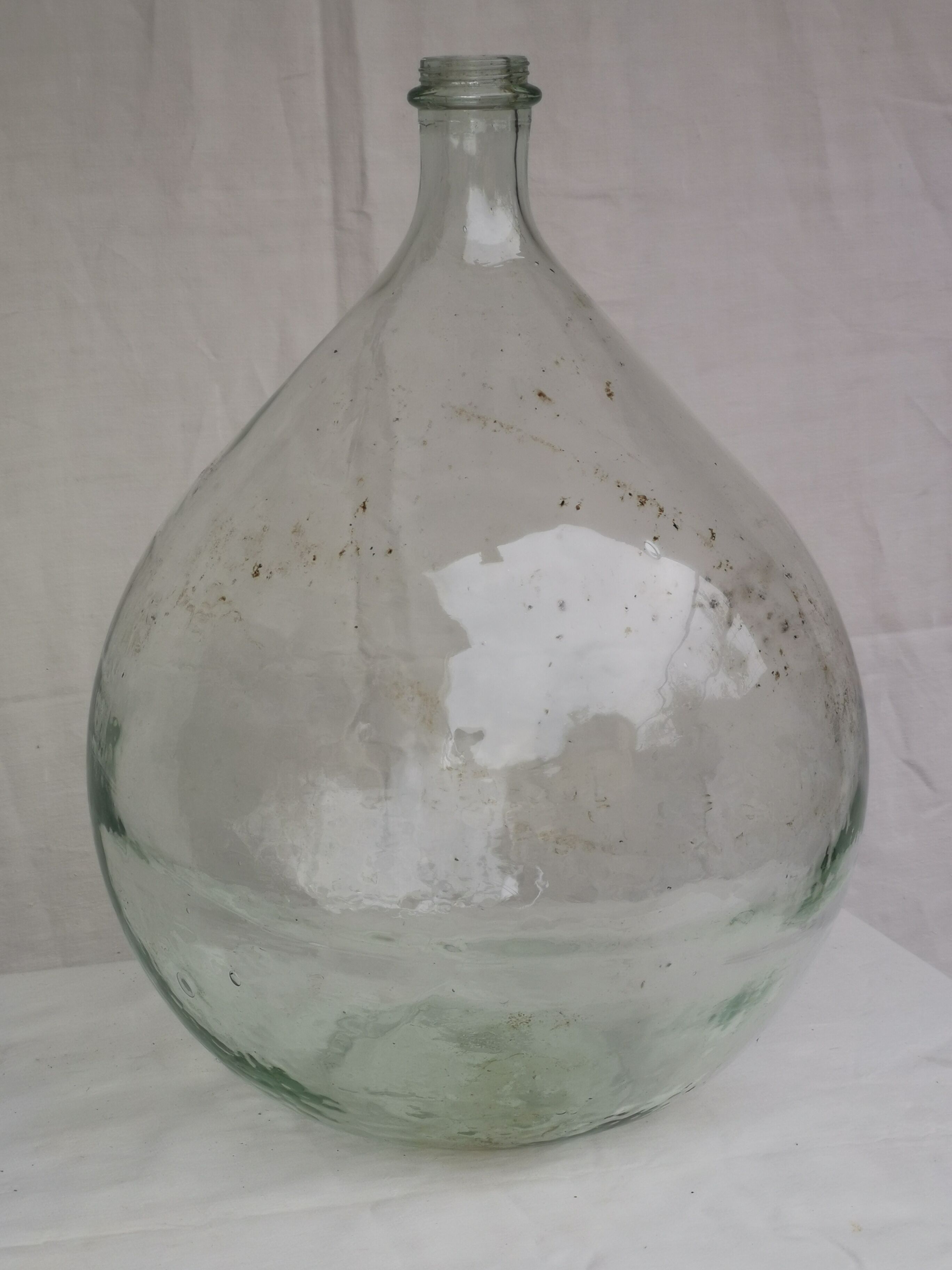 Large old lady Jeanne in transparent glass