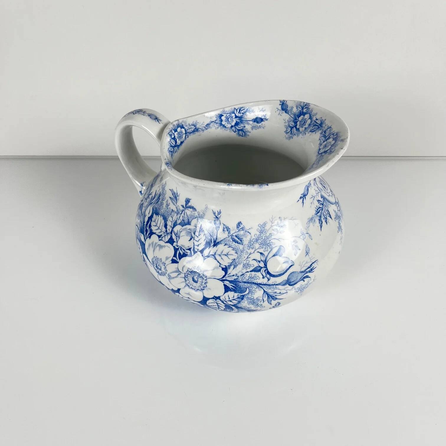 Chubby pitcher, old toilet jug KG Lunéville, blue flower pattern, late 19th to early 20th century.