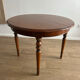 Round table in cherry wood - classic and timeless style