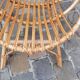 Pairs of shell rattan armchairs from the 50