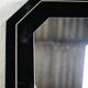 70s mirror, black lacquered wood, brass edging. Octagonal