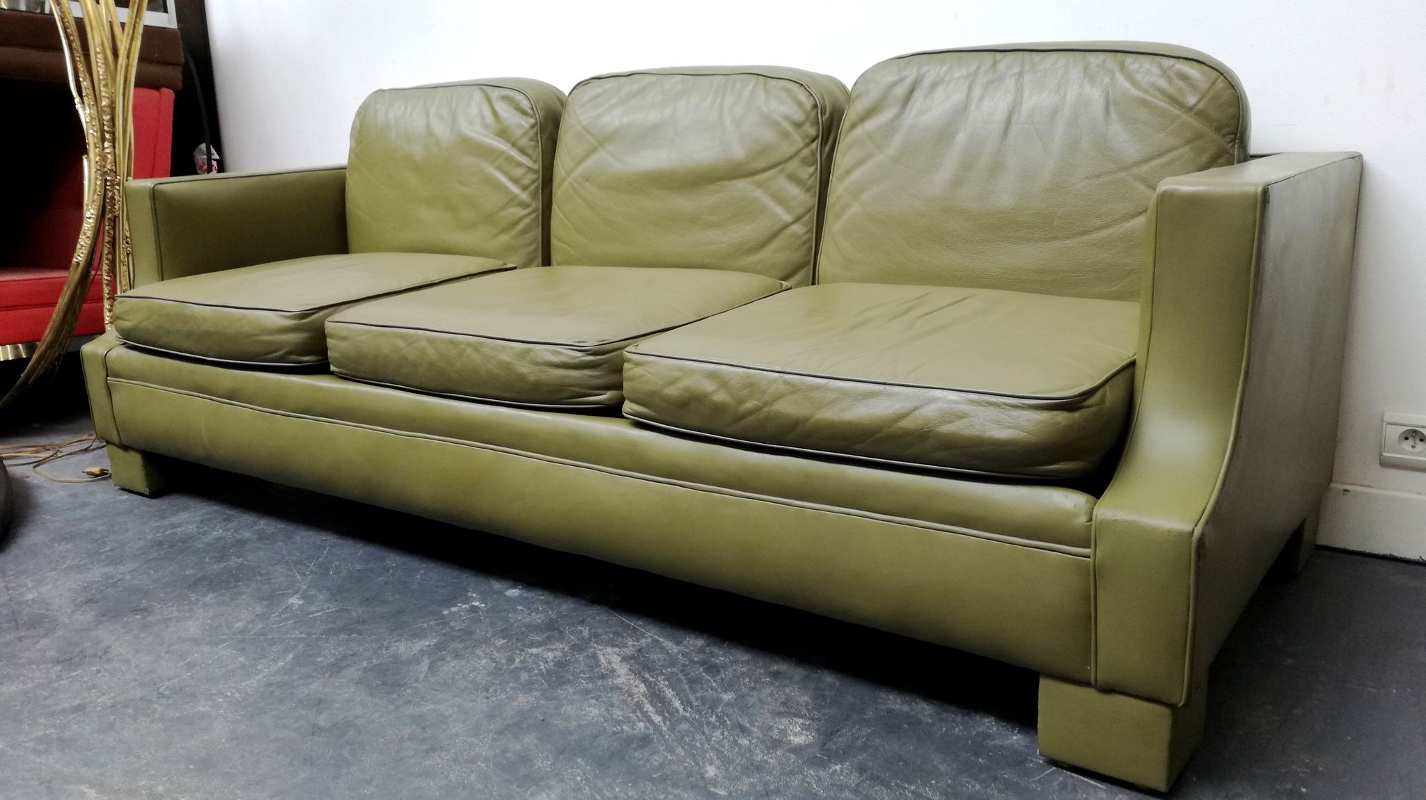 Jansen Olive green leather sofa France 1970
