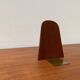 Mid-century Scandinavian bookends in teak and brass.