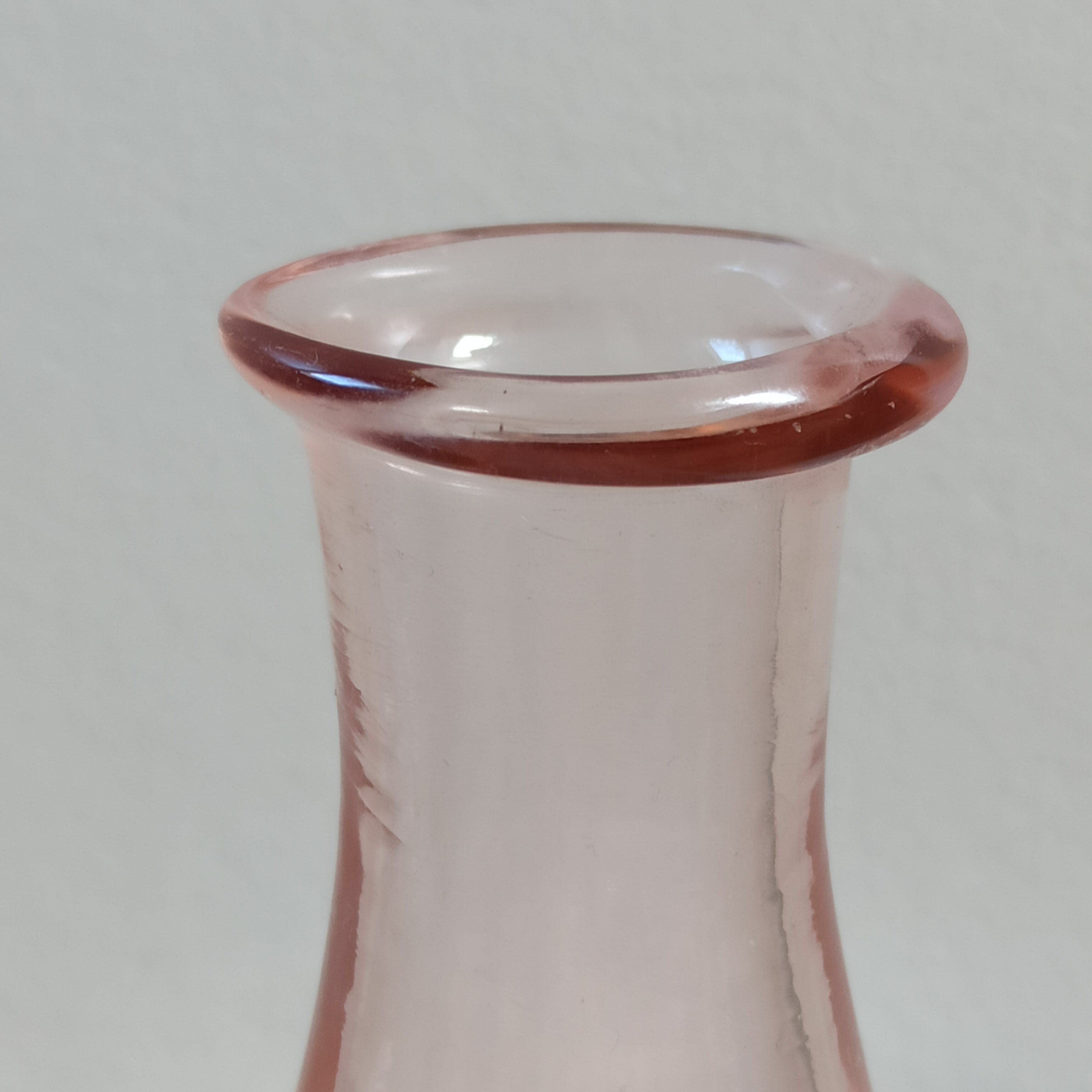 Vintage pink glass bottle vases